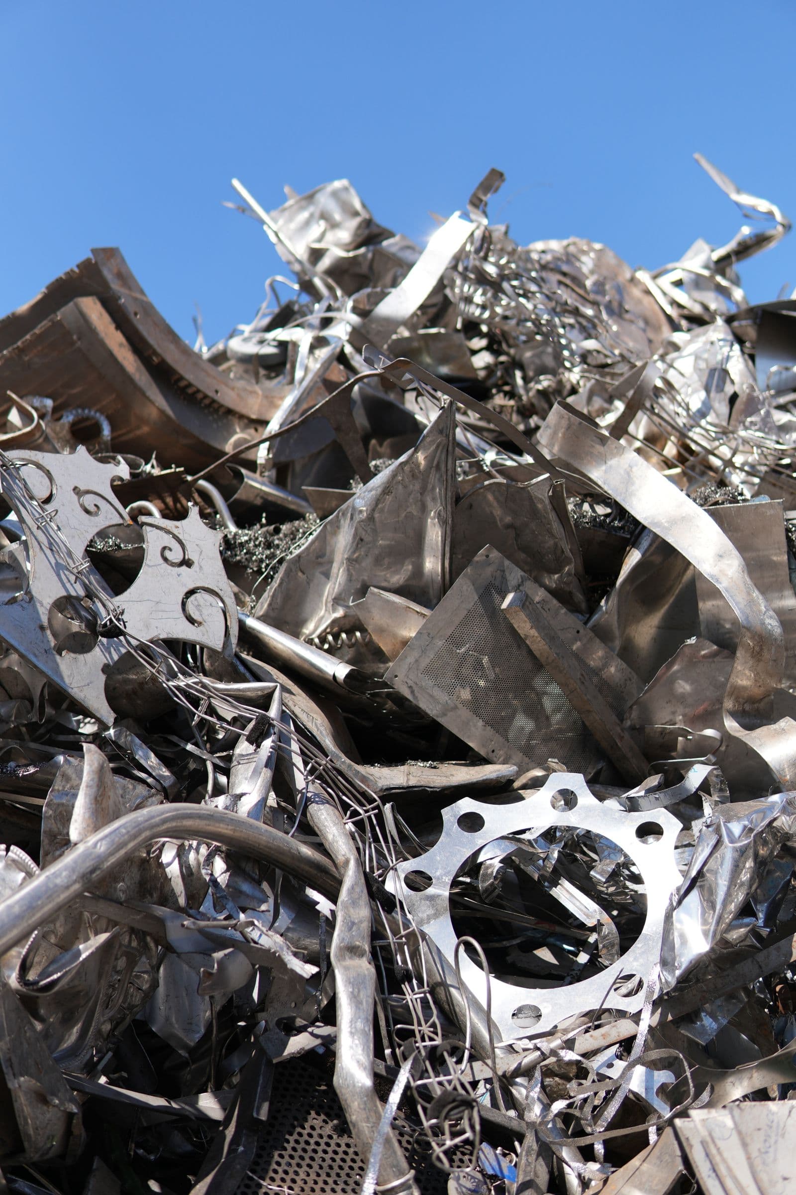A pile of scrap metal offcuts and sheet metal